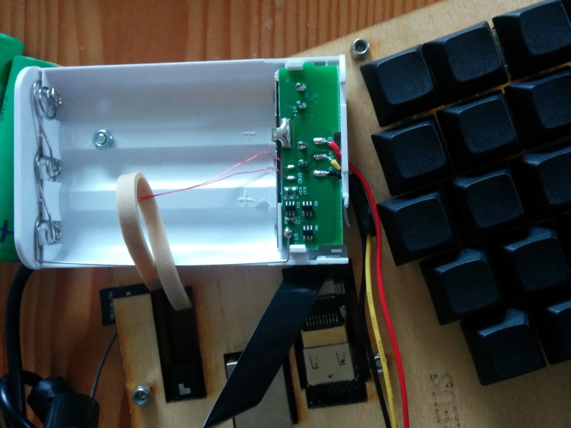 A screw hole holding the battery pack in place